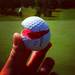 A crushed drive splits a ball in half. (thesaylor)
